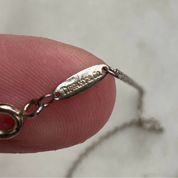Tiffany & Co. Floating Heart Necklace Sterling Silver 925
16 inch chain - Picture 6 of 9
